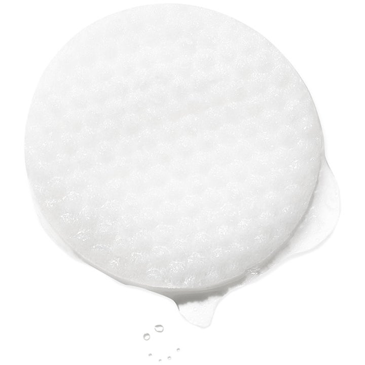 Exuviance Pure Retinol Correcting Peel 6 stk ansigtspeeling med en hvid tekstureret rondel vædet i klar væske