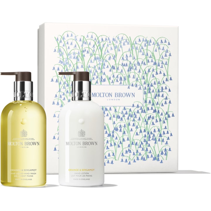 Molton Brown Orange & Bergamot 2x300ml håndplejesæt der renser og fugter i gul og hvid flaske med en gaveæske.
