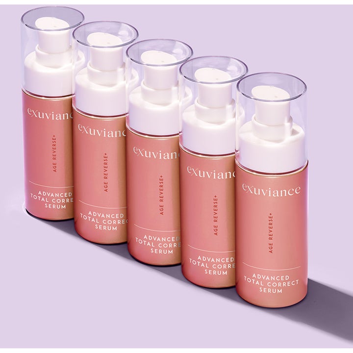 Exuviance Age Reverse Total Correct + Sculpt Serum 30 ml opstrammende serum i række af rosa flasker