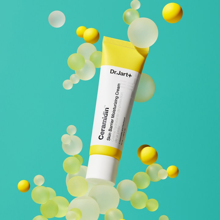 Dr.Jart+ Ceramidin Skin Barrier Moisturizing Cream 15 ml fugtgivende ansigtscreme i gul tube omgivet af gule bobler