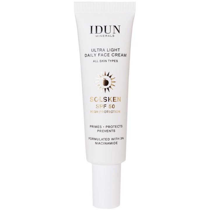 IDUN Minerals Solsken Ultra Light Daily Face Cream SPF 50 ansigtscreme med niacinamid i hvid tube med guldlogo
