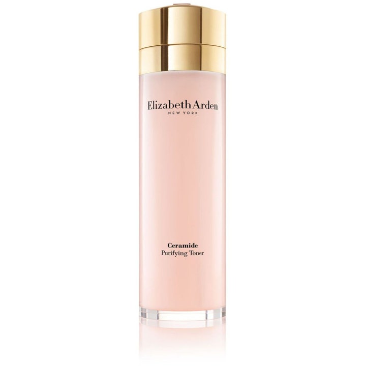 Elizabeth Arden Ceramide Purifying Toner 200ml beroligende skintonic i en klar flaske med ferskenfarvet indhold og guldlåg.