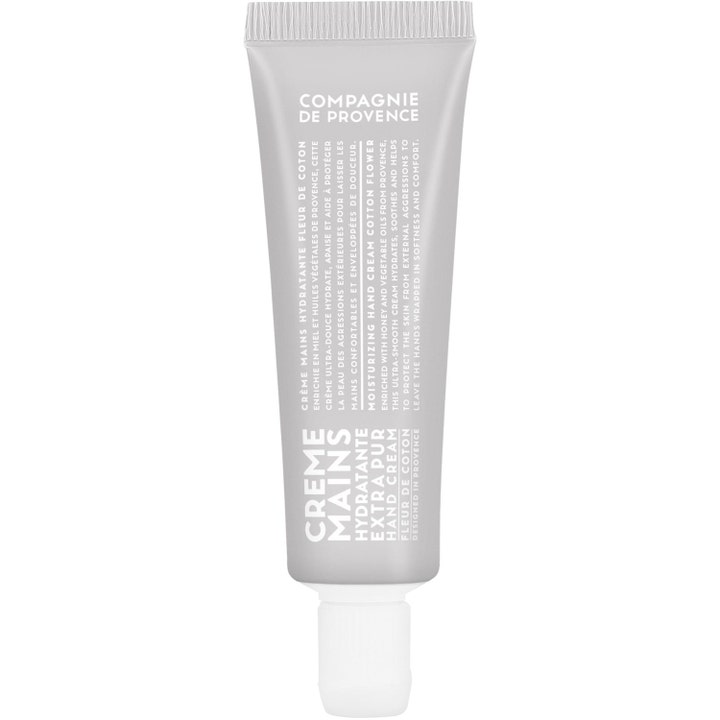 Compagnie de Provence Fleur de Coton fugtgivende håndcreme i grå tube med hvid tekst der giver bløde hænder