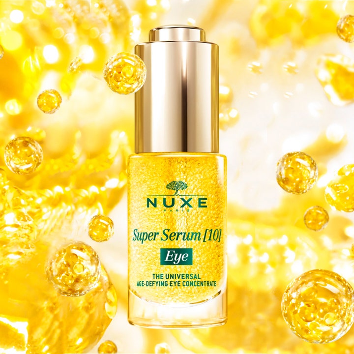Nuxe Super Serum [10] Eye 15 ml øjenserum mod rynker i glasflaske med svævende gyldne perler