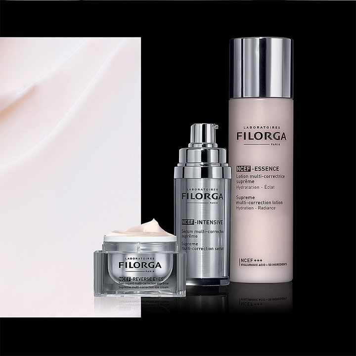 Filorga NCEF-Reverse Eyes 15 ml multi-korrigerende øjencreme i krukke sammen med matchende serum og essence.