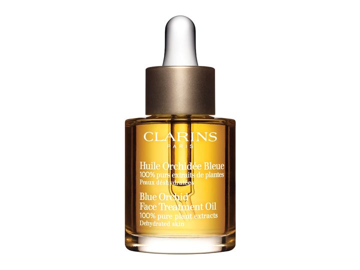 Clarins Blue Orchid Face Treatment Oil fugtgivende ansigtsolie til dehydreret hud i glasflaske med pipette og guldlåg.