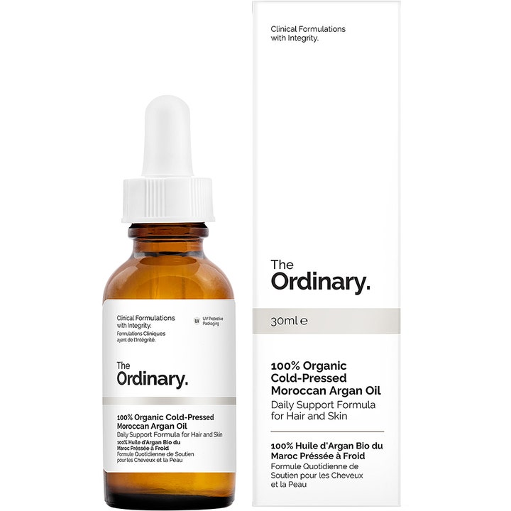The Ordinary 100% Organic Cold-Pressed Moroccan Argan Oil 30ml plejende olie i ravfarvet glasflaske og hvid æske.