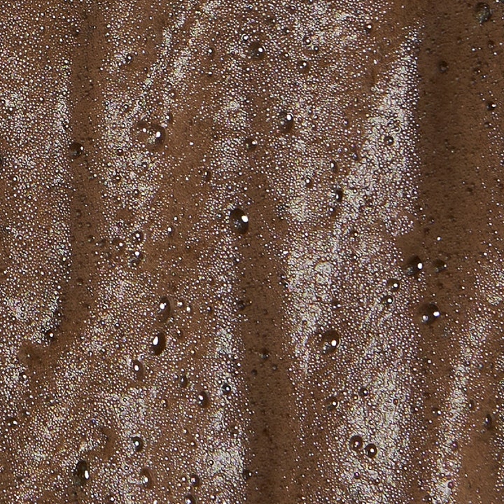 Bronza Bronzing Mousse Deep Bronze 200 ml selvbruner til kroppen med en luftig mørkebrun og boblende tekstur