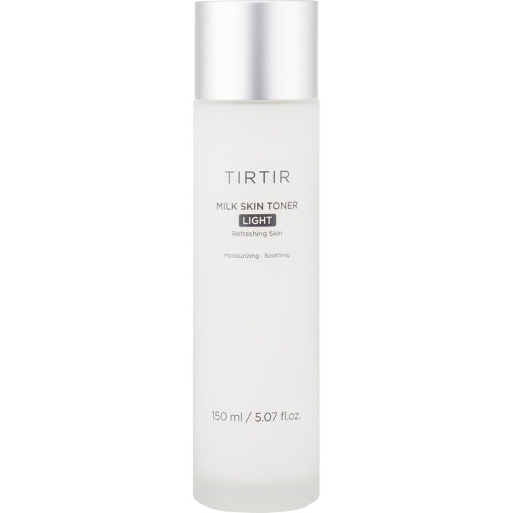 TIRTIR Milk Skin Toner Light 150 ml beroligende toner i en høj flaske af frostet glas med sølvlåg