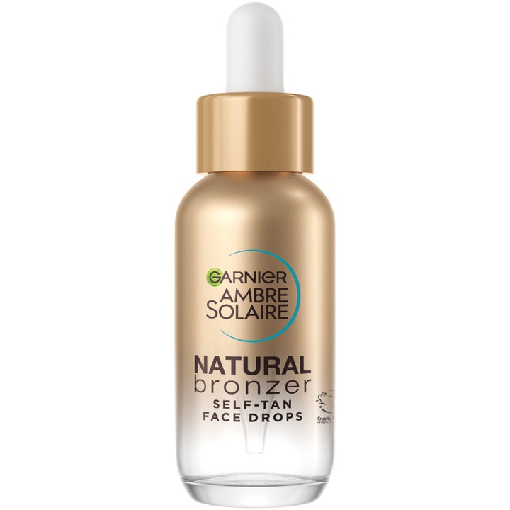 Garnier Ambre Solaire Natural Bronzer Face Drops giver naturlig glød i guldtonet glasflaske med hvid pipette