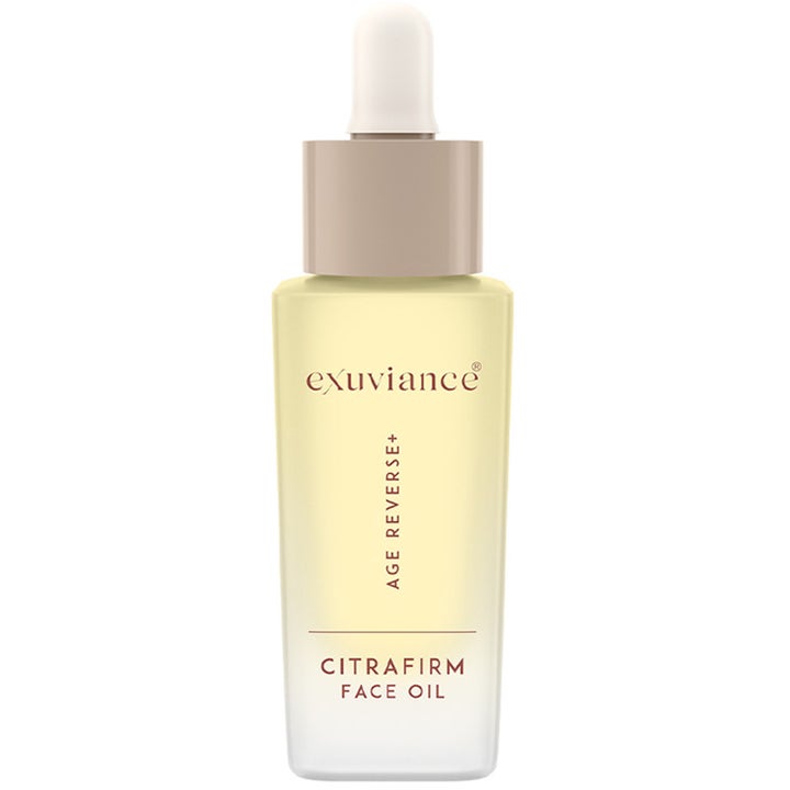 Exuviance Age Reverse+ Citrafirm Face Oil 30 ml opstrammende ansigtsolie i frostet glasflaske med gul olie og beige pipette