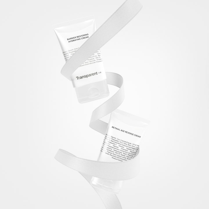 Niche Beauty Lab Transparent Lab Barrier Restoring Hydrating Cream 50 ml fugtgivende ansigtscreme i hvide tuber svævende.