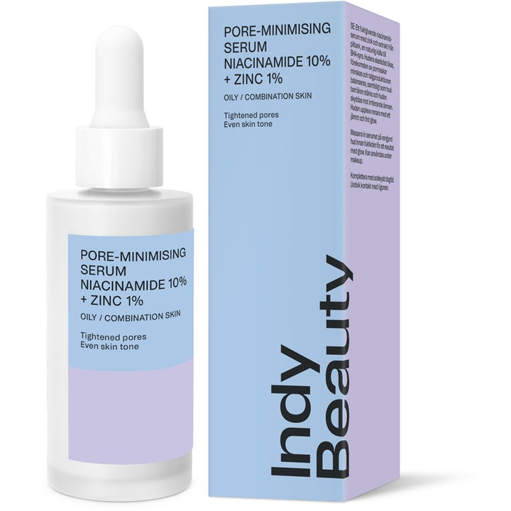 Indy Beauty Pore-minimising Serum 30 ml med niacinamid mindsker porer i hvid pipetteflaske og lyseblå æske