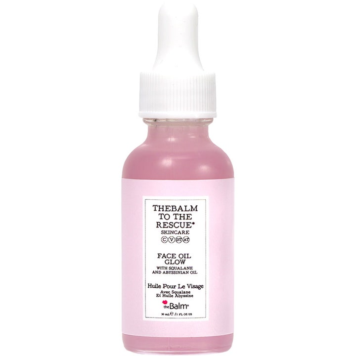theBalm To The Rescue Face Oil Glow 30 ml glødgivende ansigtsolie i glasflaske med lyserød væske og hvid pipette