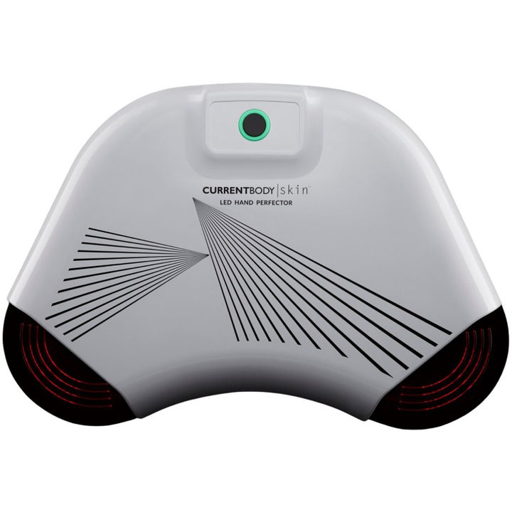 CurrentBody Skin LED Hand Perfector 1 stk anti-aging lysbehandling i hvid buet enhed med rødt lys i bunden