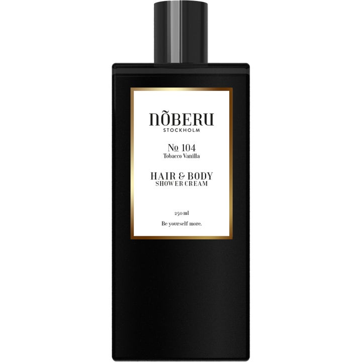 Nõberu No 104 Tobacco Vanilla 250 ml shower cream i en stilren sort flaske med hvid og guld label.