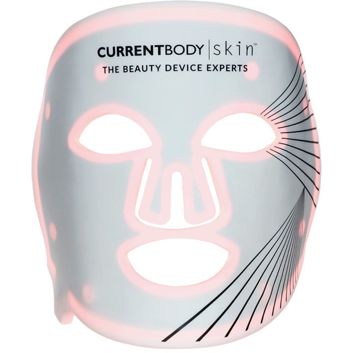 Currentbody Skin LED Light Therapy Face Mask Series 1 hudplejeenhed med lyserødt lys og sorte linjer