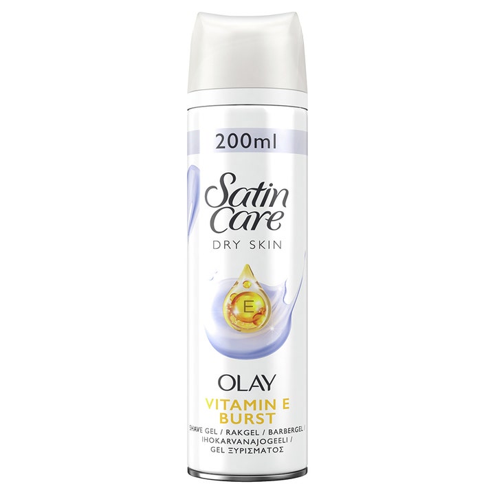 Satin Care Olay Vitamin E Burst 200ml rakgel til tør hud i hvid spraydåse med lilla grafik og en gylden oliedråbe.