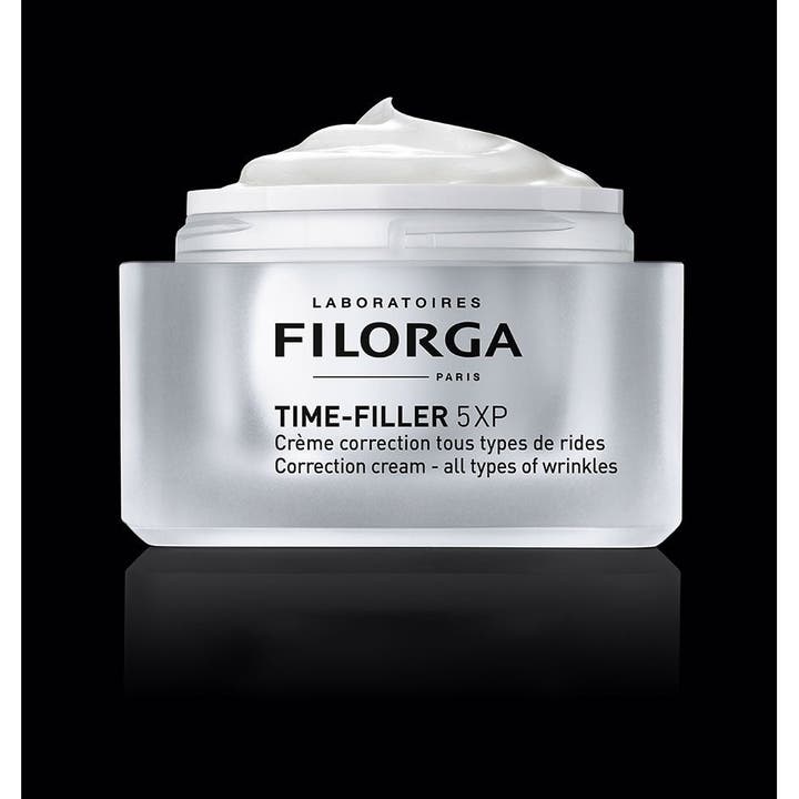 FILORGA Time-Filler 5XP Cream 50 ml rynkekorrigerende dagcreme i sølvfarvet krukke med synlig hvid tekstur