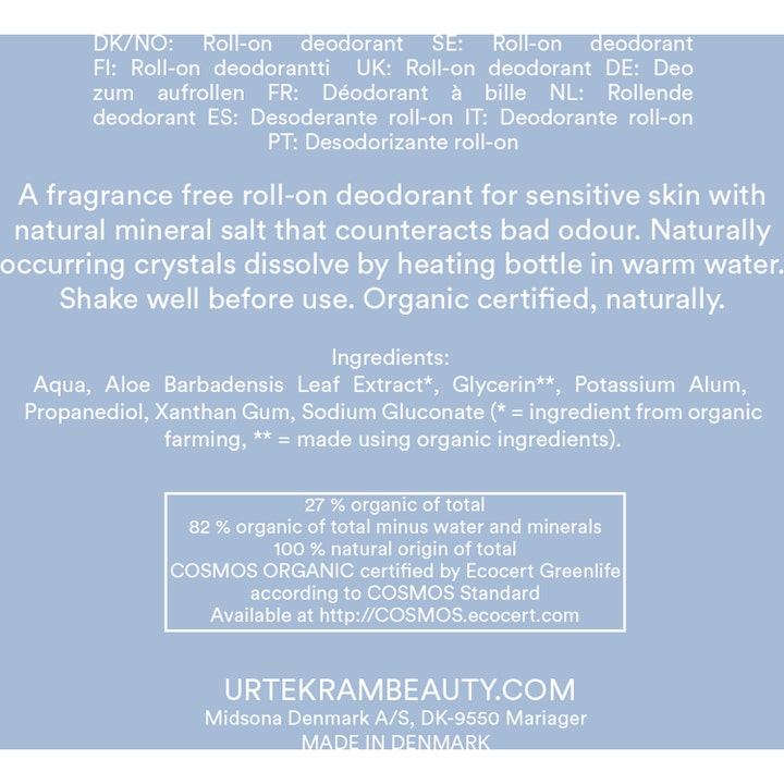 Urtekram Deodorant Fragrance Free 50 ml mod lugt til sensitiv hud viser lyseblå bagside med ingrediensliste og certifikat.