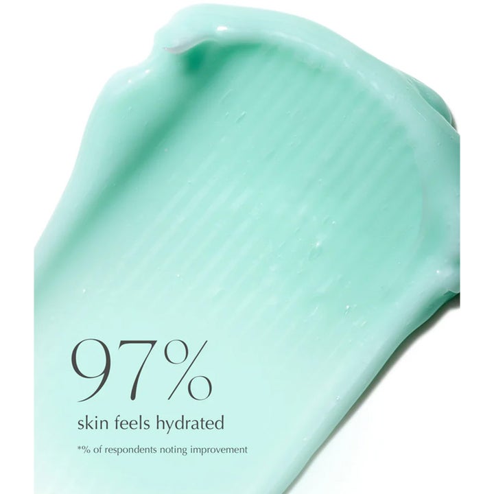 Exuviance Age Reverse Hydrafirm 50 g fugtgivende natcreme med lysegrøn cremetekstur og teksten 97% skin feels hydrated