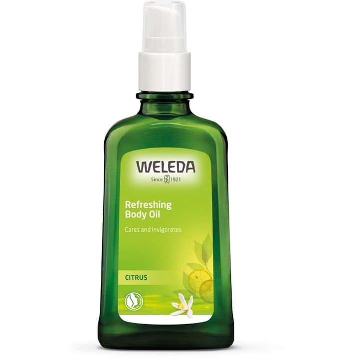 Weleda Refreshing Body Oil Citrus 100 ml opfriskende kropsolie i mørkegrøn glasflaske med hvid pumpe og citrongrafik