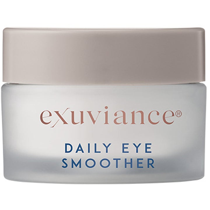 Exuviance Daily Eye Smoother 15 ml fugtgivende øjencreme i en krukke af frostet glas med et stilrent beige låg.