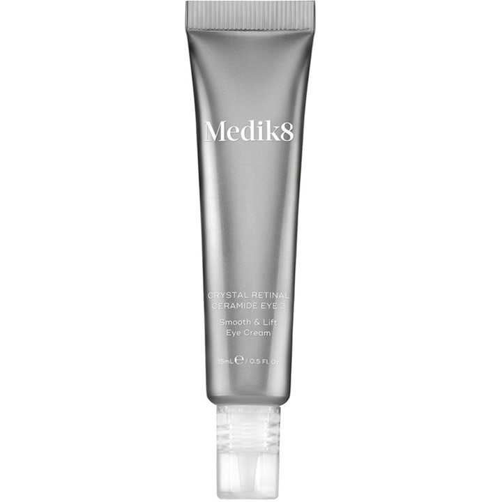 Medik8 Crystal Retinal Ceramide Eye 3 15 ml opstrammende øjencreme i metallisk sølvfarvet tube med gennemsigtig hætte