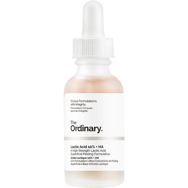 The Ordinary Lactic Acid 10% + HA 30 ml eksfolierende serum i frostet glasflaske med hvid pipette og ferskenfarvet indhold