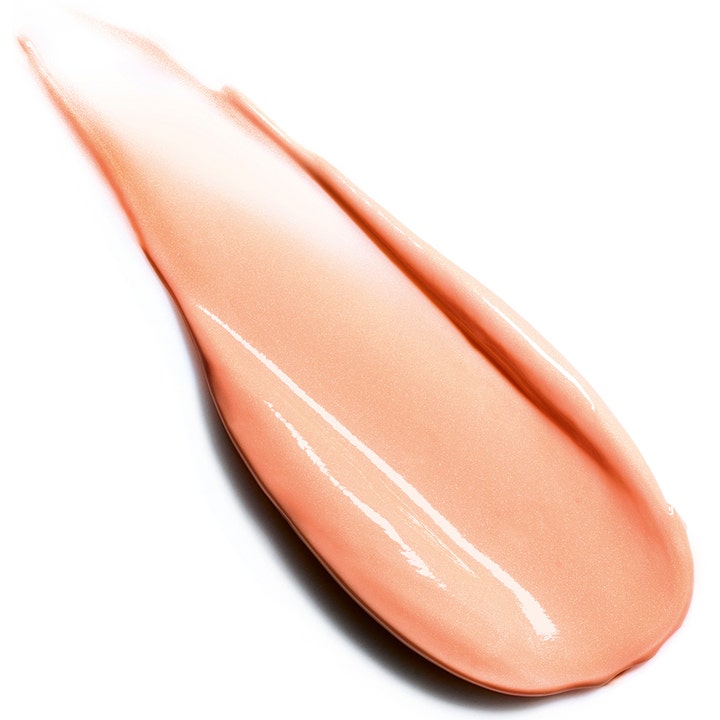 Clarins Extra-Firming Energy Day Cream 50 ml dagcreme med en cremet ferskenfarvet tekstur der giver glød og fasthed