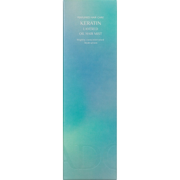 La'dor Keratin Layered Mist 130 ml fugtgivende hårmist i rektangulær æske med turkis og blå farveovergang