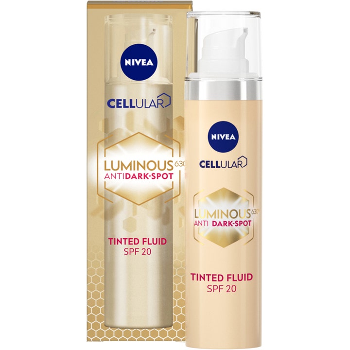 Nivea Cellular Luminous 630 Tinted Fluid SPF 20 mod pigmentpletter i beige pumpeflaske og matchende guldæske