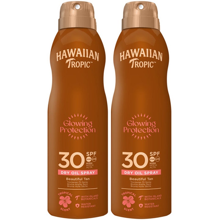 Hawaiian Tropic Glowing Protection Dry Oil Spray SPF 30 sololie giver glød i to brune sprayflasker.