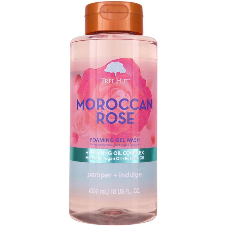 Tree Hut Moroccan Rose 532 ml fugtgivende body wash i gennemsigtig flaske med stor lyserød rose og kobberlåg.