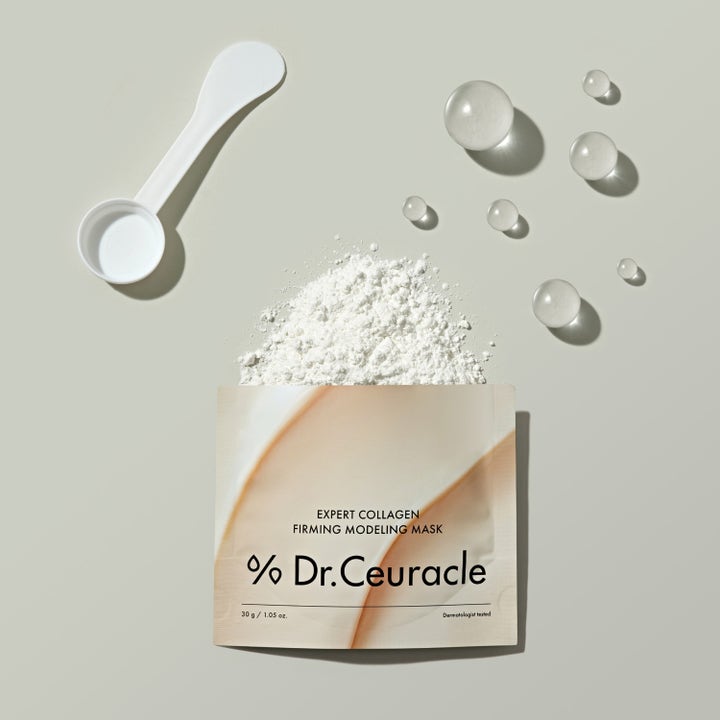 Dr. Ceuracle Expert Collagen Firming Modeling Mask 30 g opstrammende ansigtsmaske med hvidt pulver og måleske.