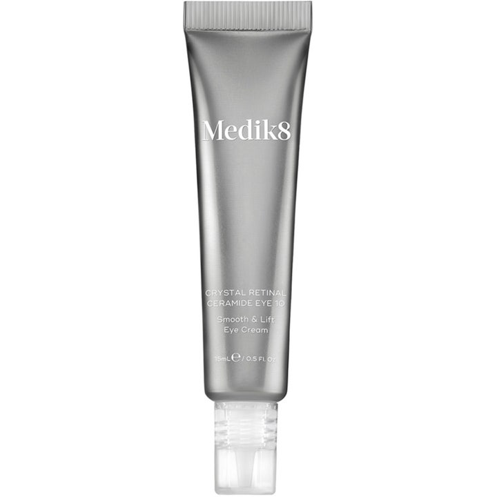 Medik8 Crystal Retinal Ceramide Eye 10 15 ml udglattende øjencreme i en metallisk sølvtube med klar hætte