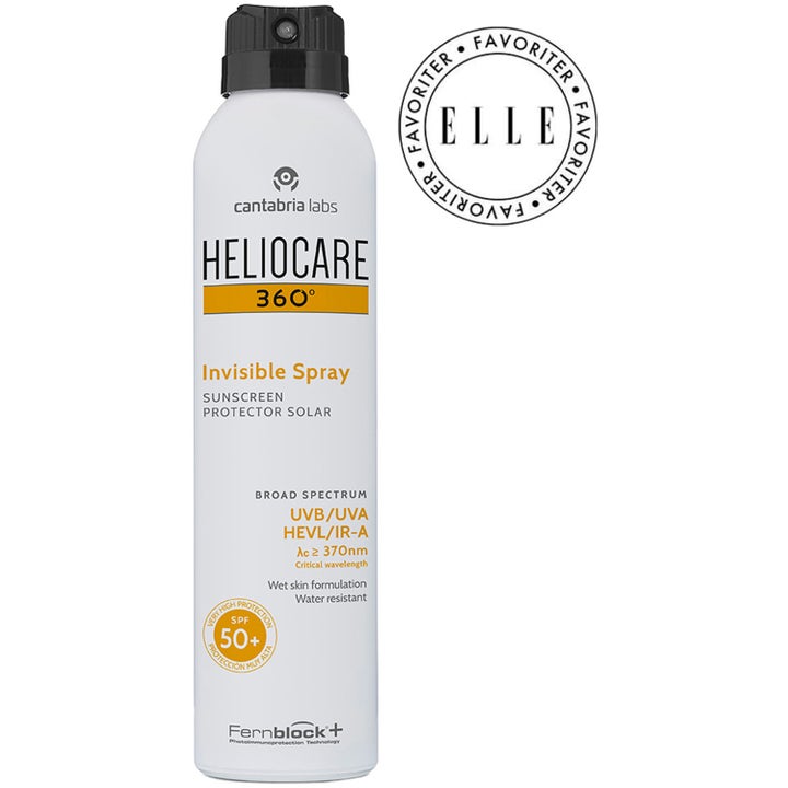 Heliocare Invisible Spray SPF 50+ 200 ml solcreme til kroppen i hvid sprayflaske med sort mundstykke og Elle-logo