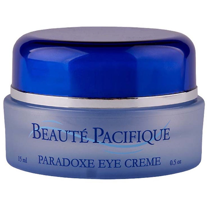 Beauté Pacifique Paradoxe Eye Creme 15 ml opstrammende øjencreme i frostet blå glaskrukke med mørkeblåt låg