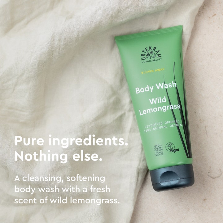 Urtekram Body Wash Wild Lemongrass 200 ml blødgørende økologisk duschtvål i grøn tube på lyst hørstof.