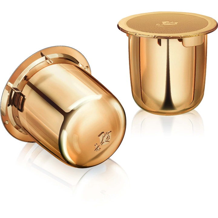 Lancôme Absolue Soft Cream 60 ml regenererende ansigtscreme vist som to skinnende guldrefill-kapsler med logo.