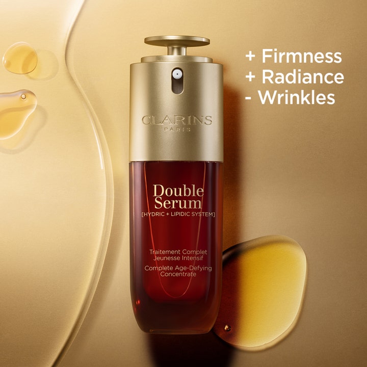 Clarins Double Serum 30 ml ansigtsserum giver fasthed og glød i ravfarvet pumpeflaske med gyldne dråber