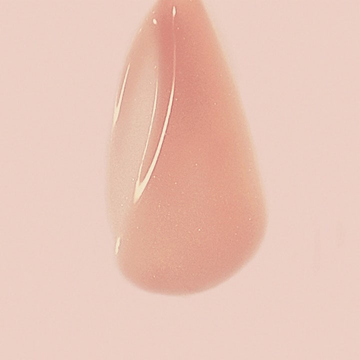MÁDARA SOS Hydra Repair Intensive Serum 30 ml fugtgivende serum med en lyserød og glansfuld flydende tekstur