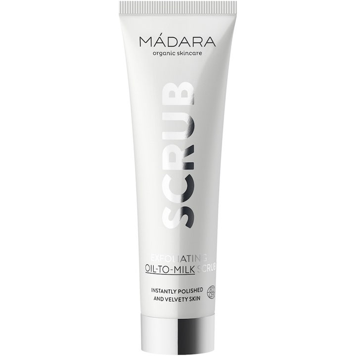 Mádara Exfoliating Oil To Milk Scrub eksfolierende ansigtsscrub i hvid tube med lodret sølvskrift og sølvlåg